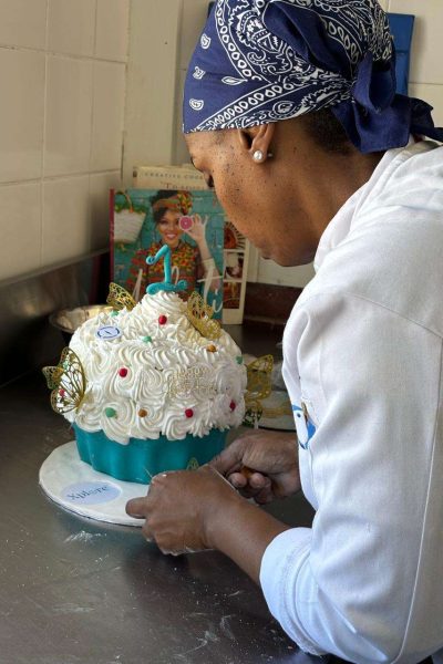 Celebrating Xploreza’s milestone with a spectacular giant cupcake