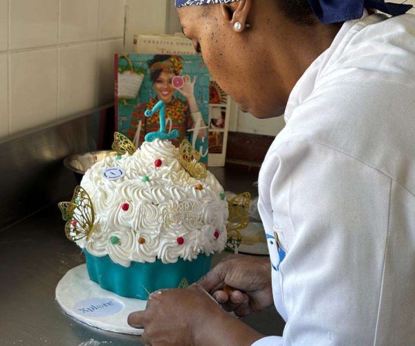 Celebrating Xploreza’s milestone with a spectacular giant cupcake